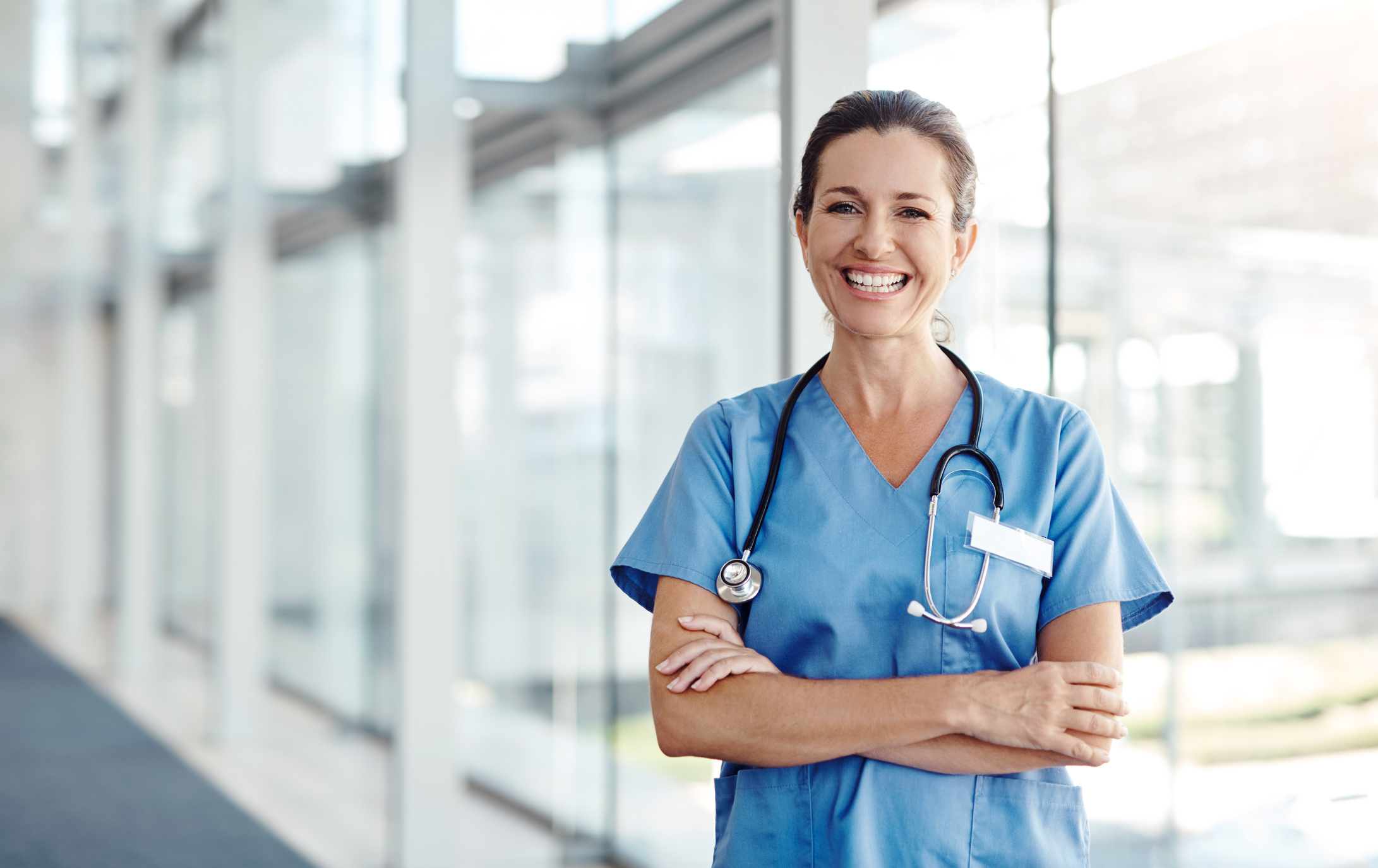 nurse smiling about quality of care